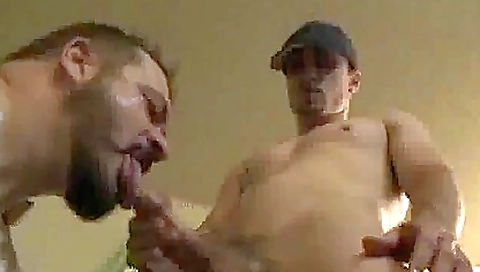 Beautiful Bearded Hunk Is Sucking A Massive Dick On